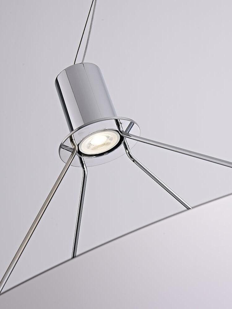 Close view of Chrome light module and thin support rods