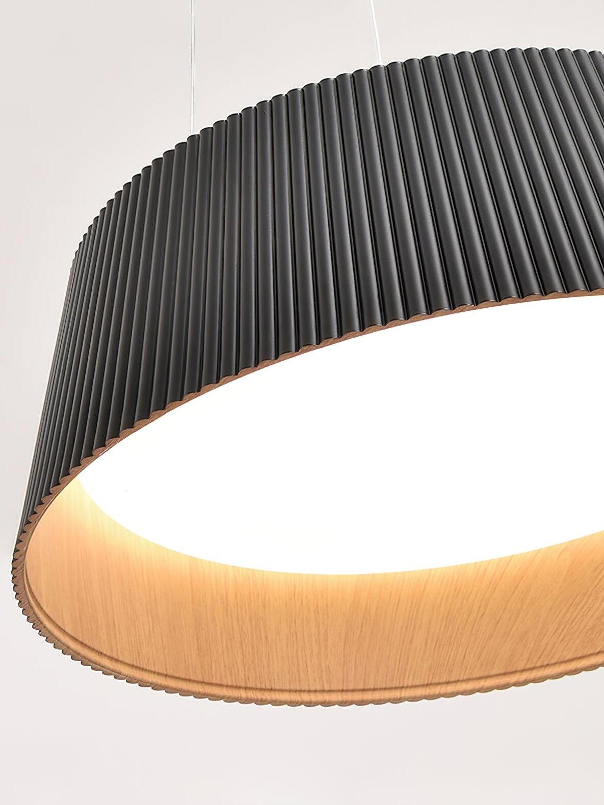 Close underside view of Black ribbed shade with a glowing white circular diffuser and tan textured inner wall
