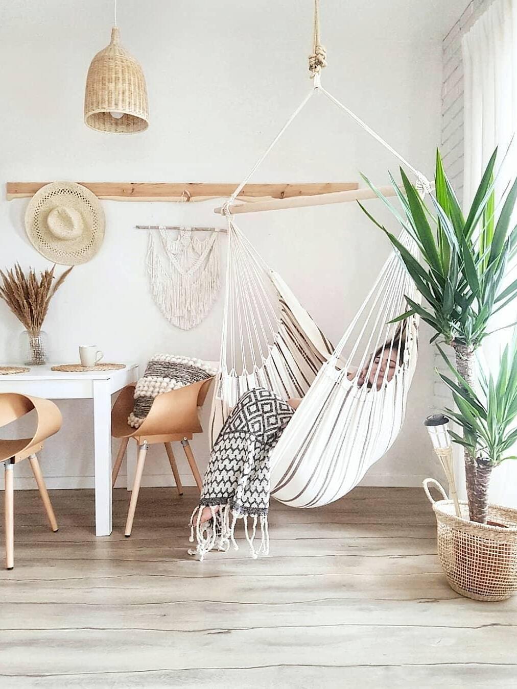 Rattan pendant in a room with hanging chair