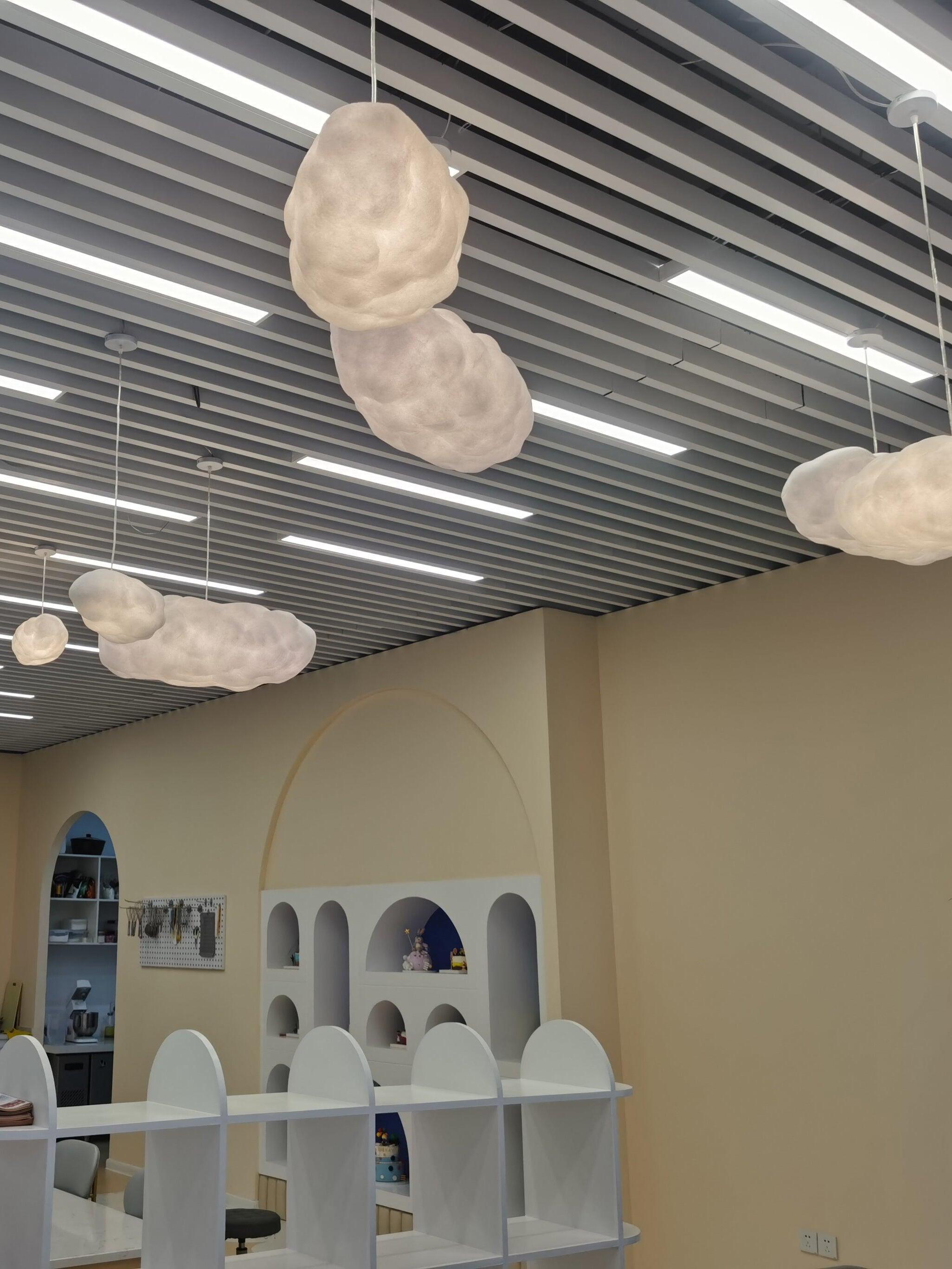 Textured cloud shades under a slatted ceiling