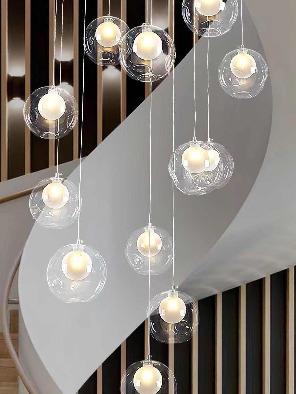 Close view of glowing glass globes by stair railing