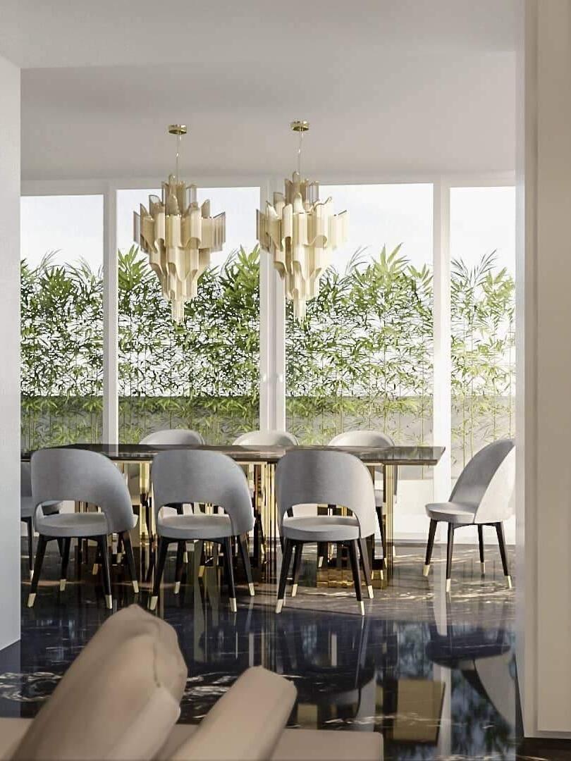 Gold chain-fringe fixture in a sunlit dining room