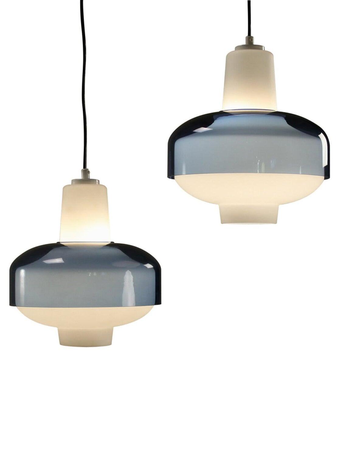 Two Trendy blue-and-white pendants hanging at different heights.
