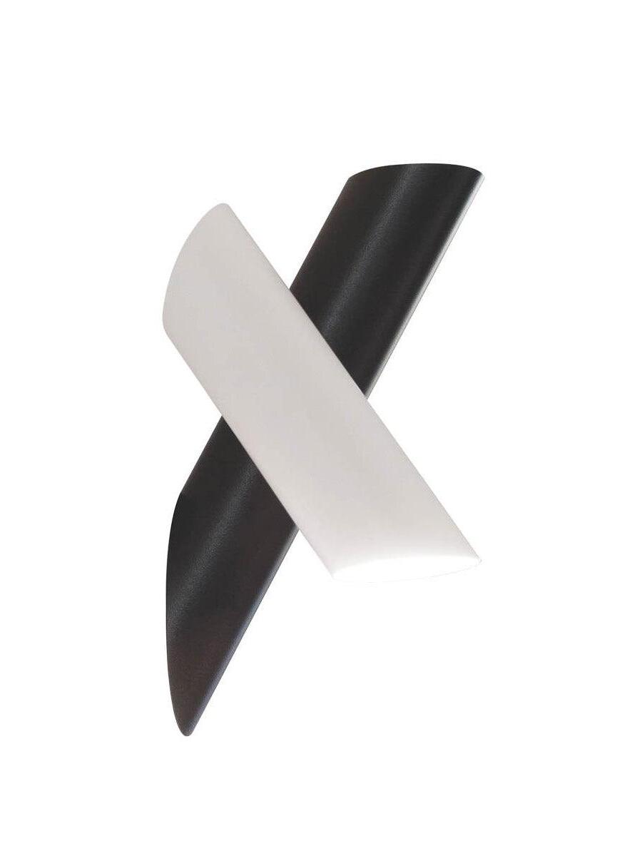 Crossed black and white tubular light elements against a white background
