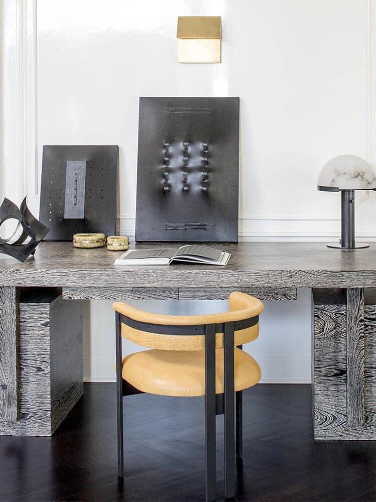 Dome lamp at the end of a desk
