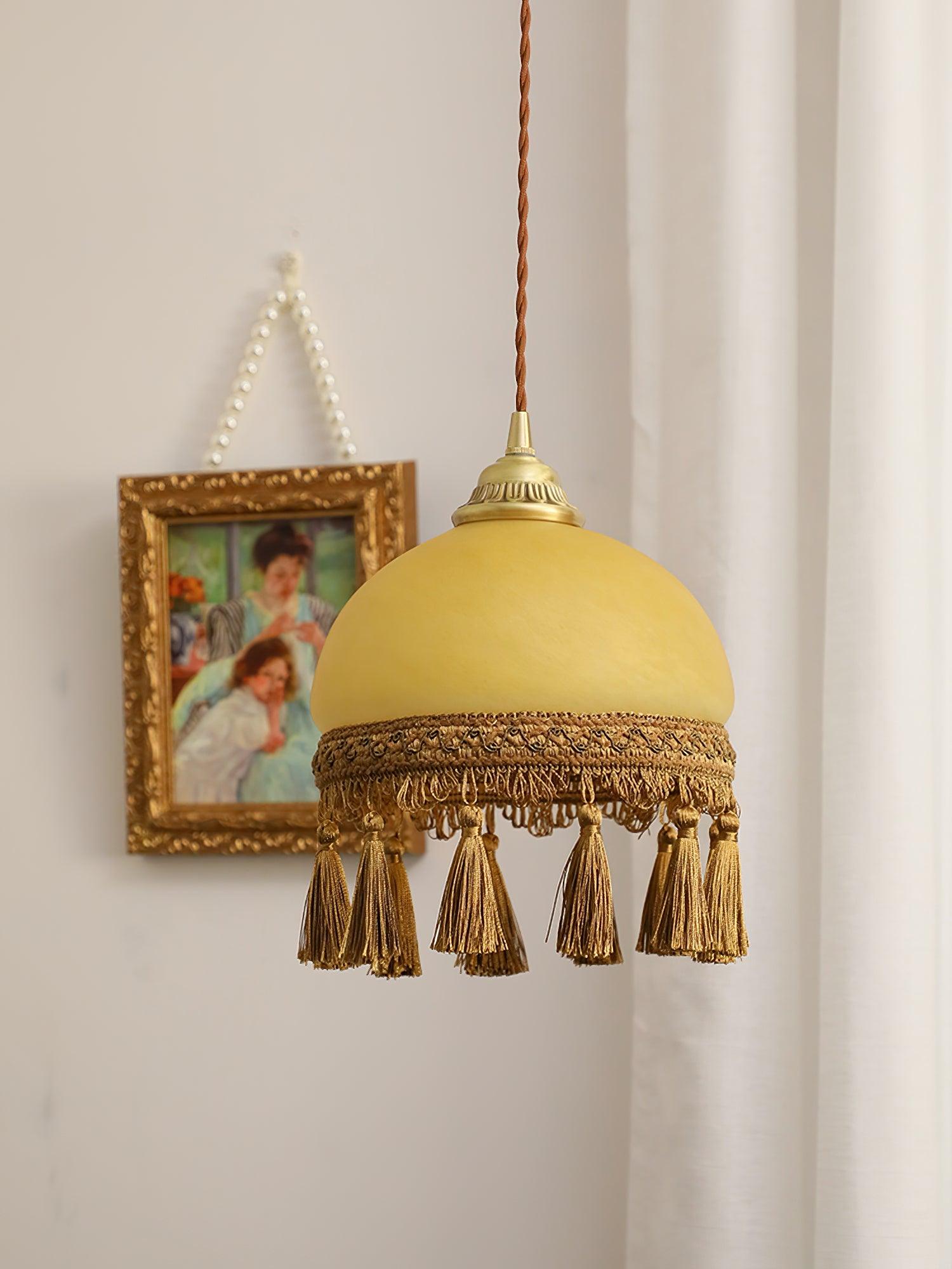 Close yellow dome and brown fabric tassels