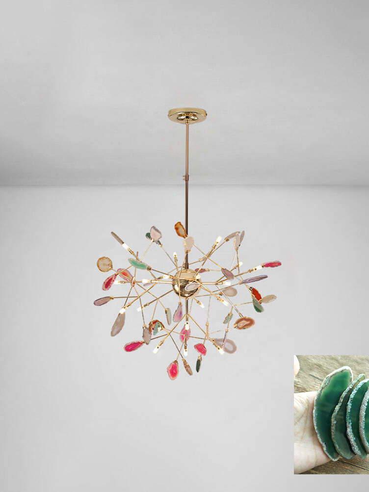 Radial multicoloured chandelier beneath a pale ceiling with a green stone sample inset