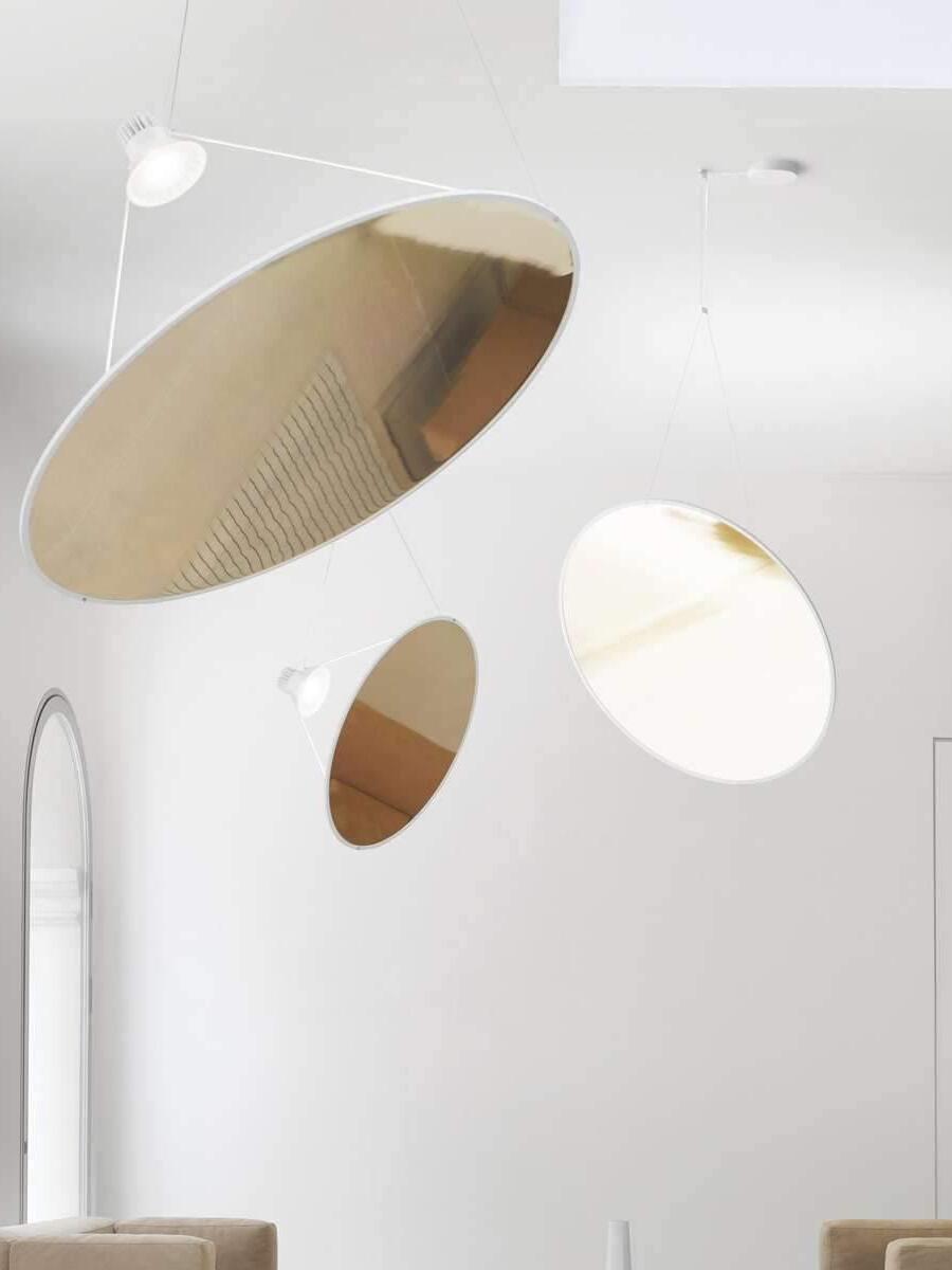 Circular reflective discs suspended at different angles