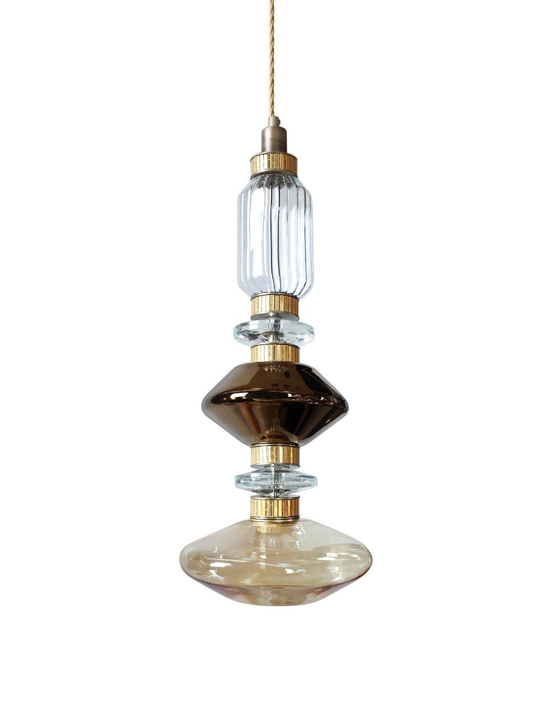 Ribbed upper glass over smoky angular section and flat clear disc