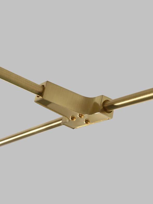 Gold crossing-arm joint and screw detail