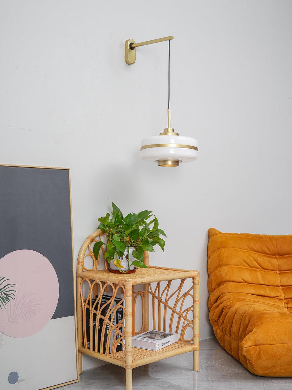 Wide view of hanging Masina shade in plant-and-yellow-chair room