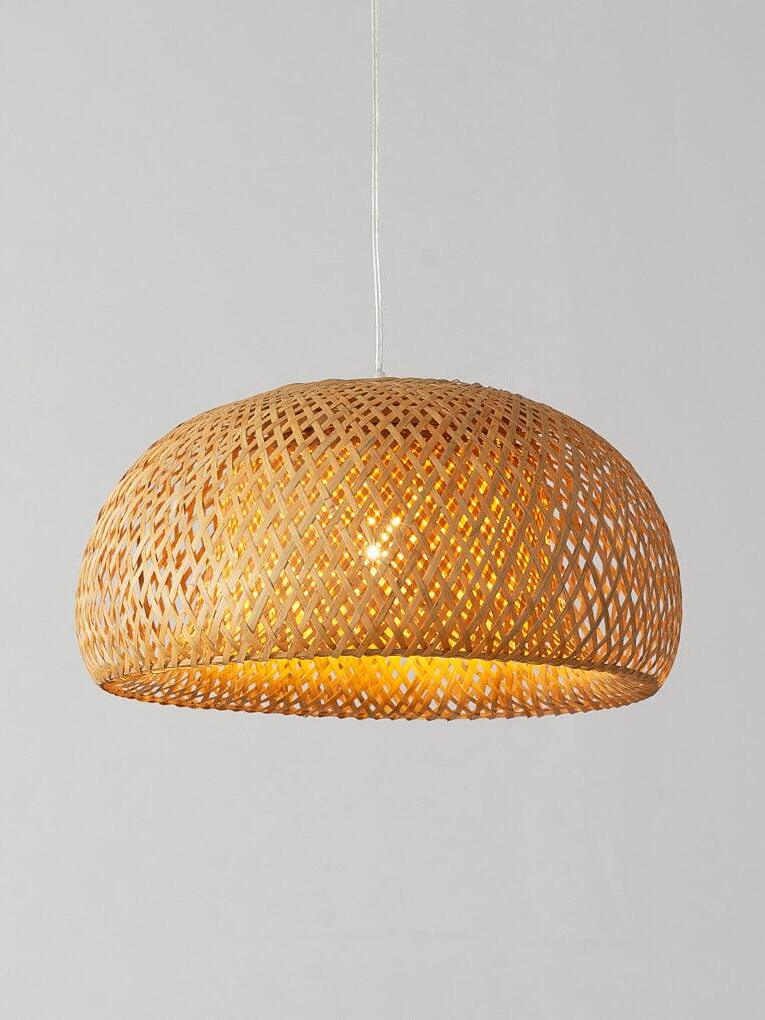 Isolated warmly lit bamboo dome with open weave