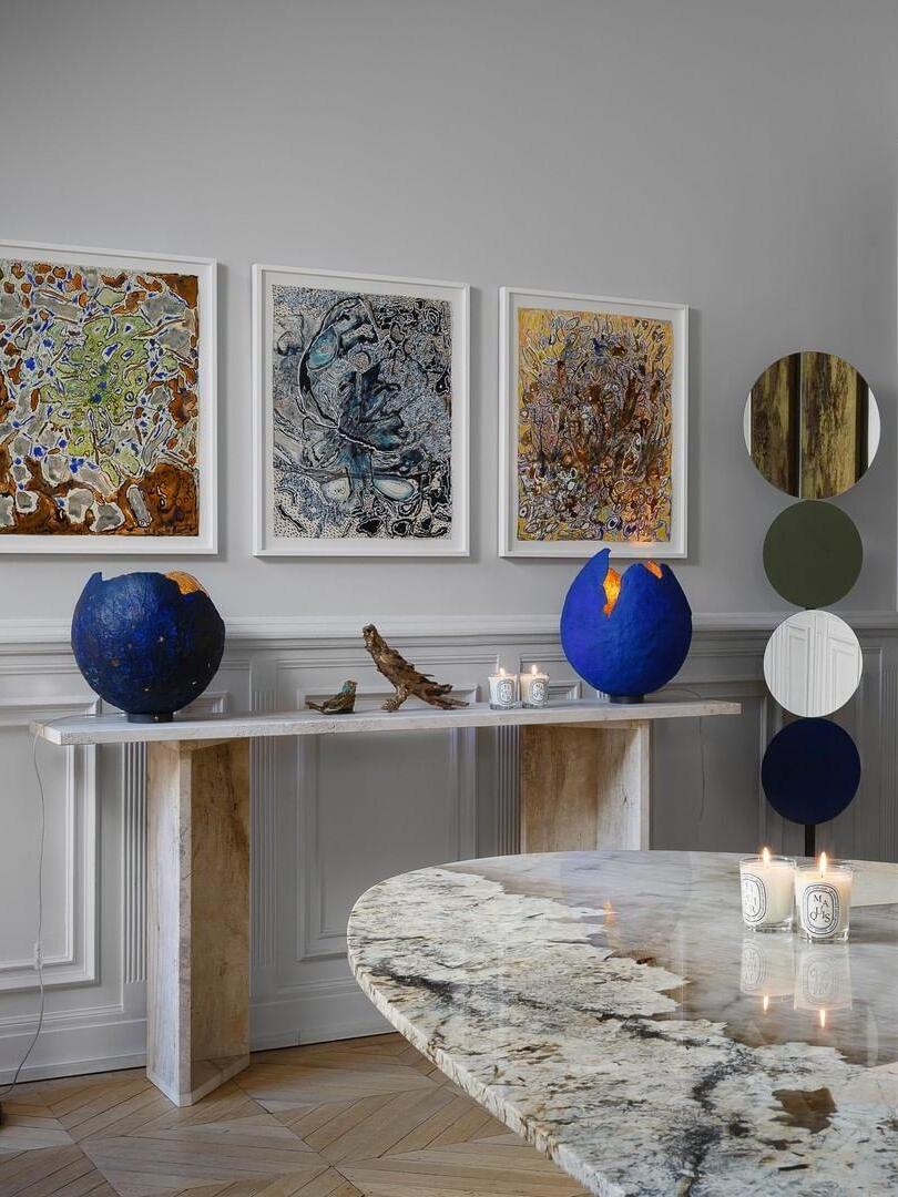 Globe lamp with contrasting coloured sections in a room display