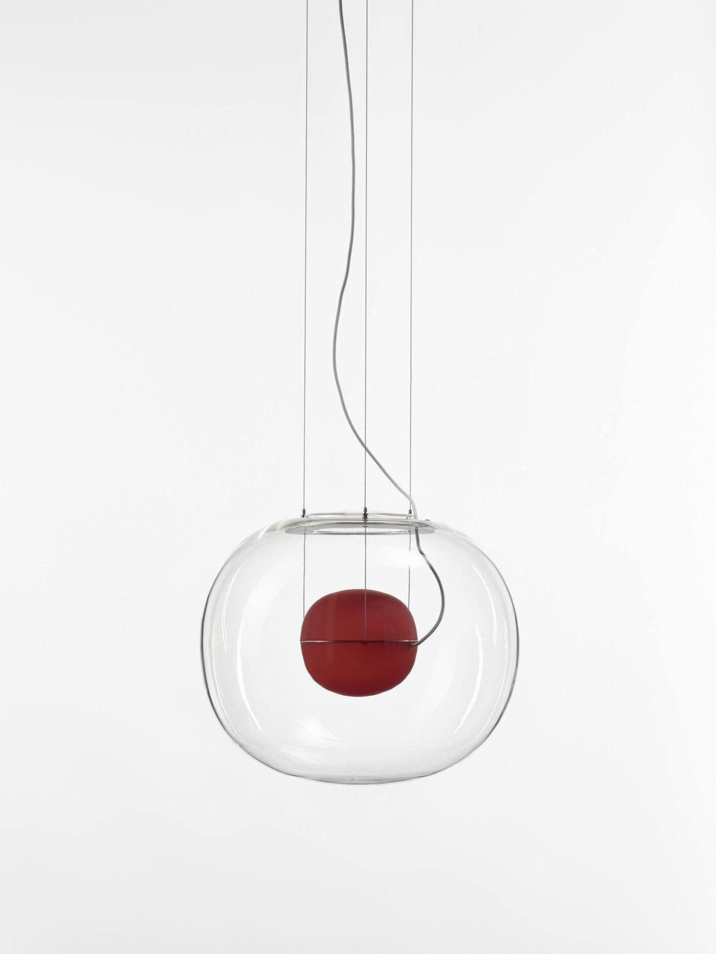 Clear glass shade around an unlit red sphere