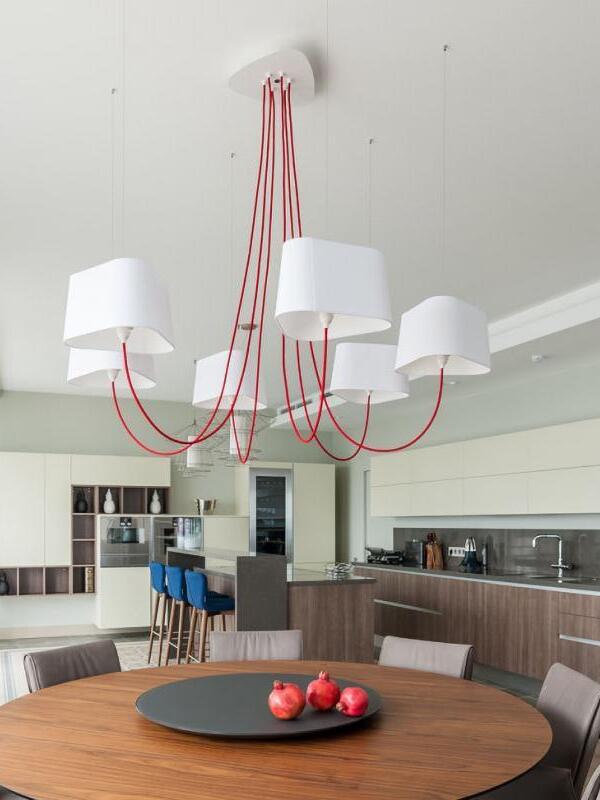 Gallery chandelier with white shades and red cords
