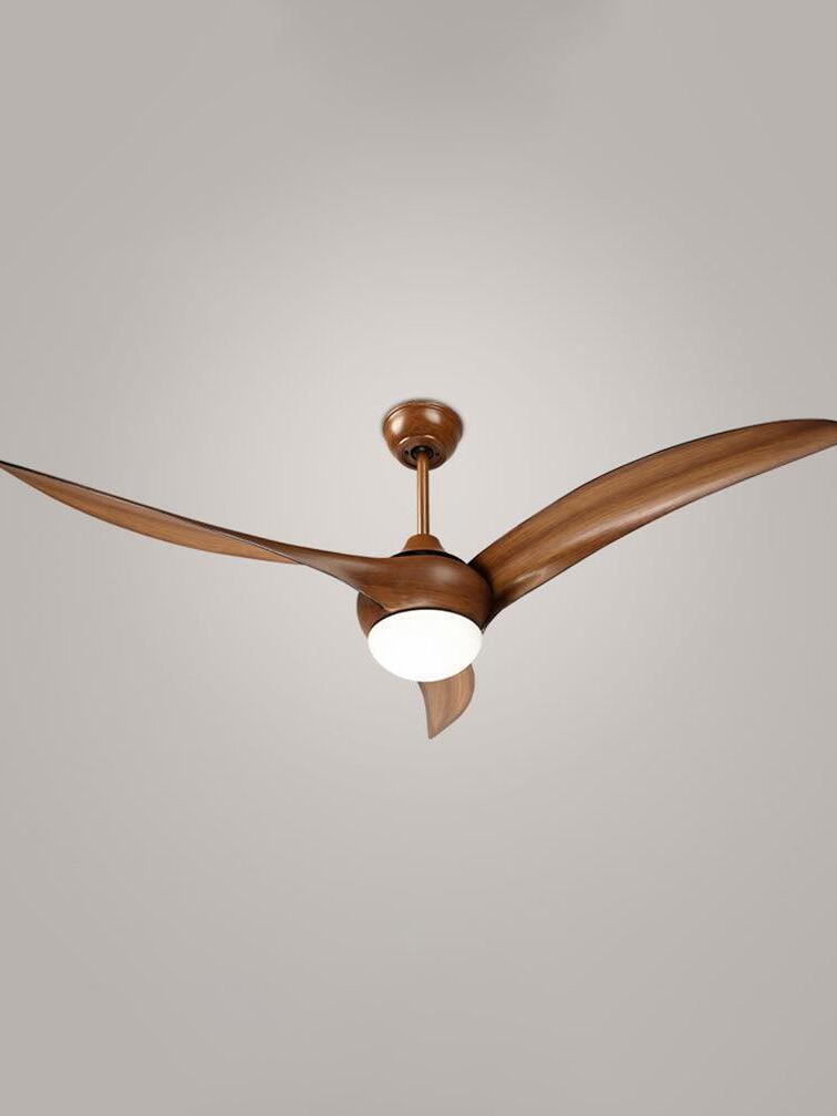 Low view of brown curved blades spreading across a ceiling around a bright circular light, rear blade pointing downward