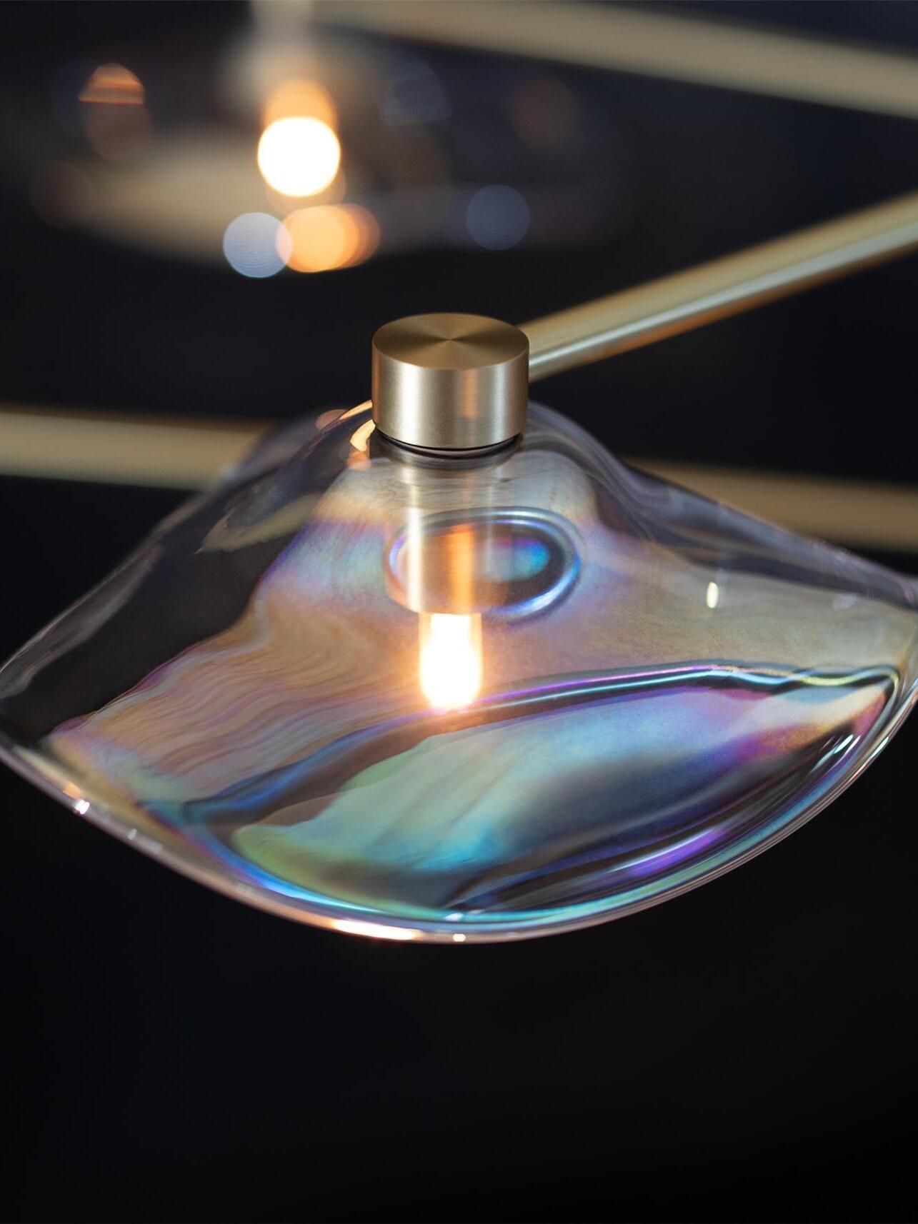 Close view of wavy glass with rainbow-like reflections