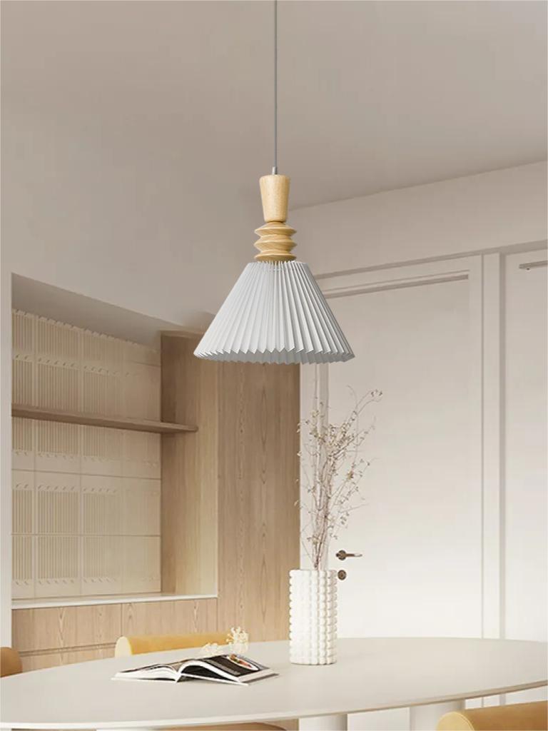 White Takumi pendant with a tall tapered wood top above stacked rings