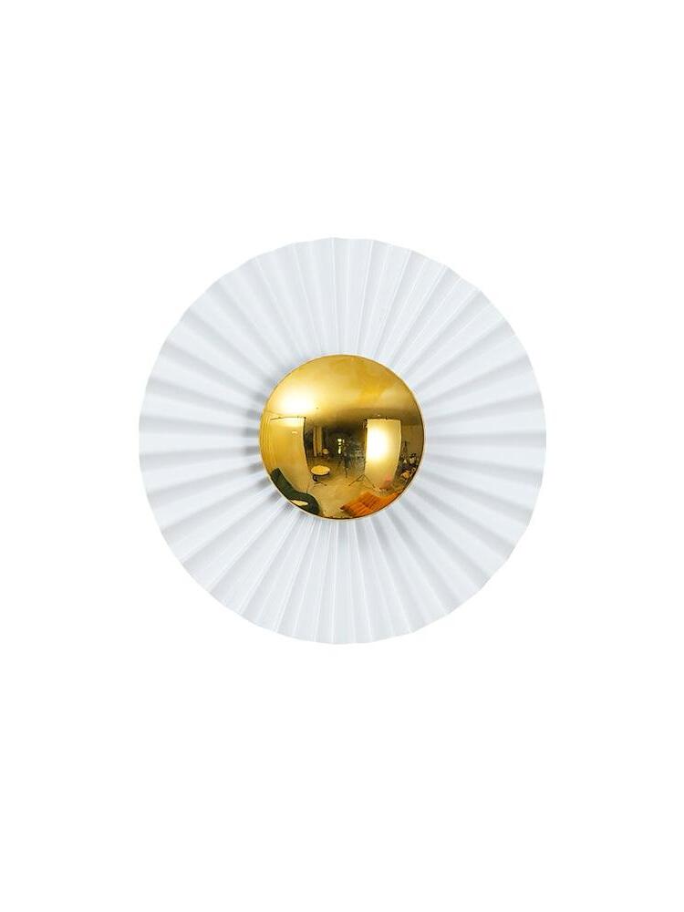 Top view of white radial pleats and gold central dome