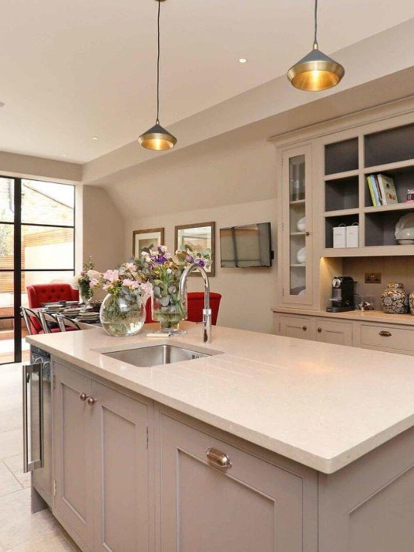 Two small conical pendants above a kitchen island