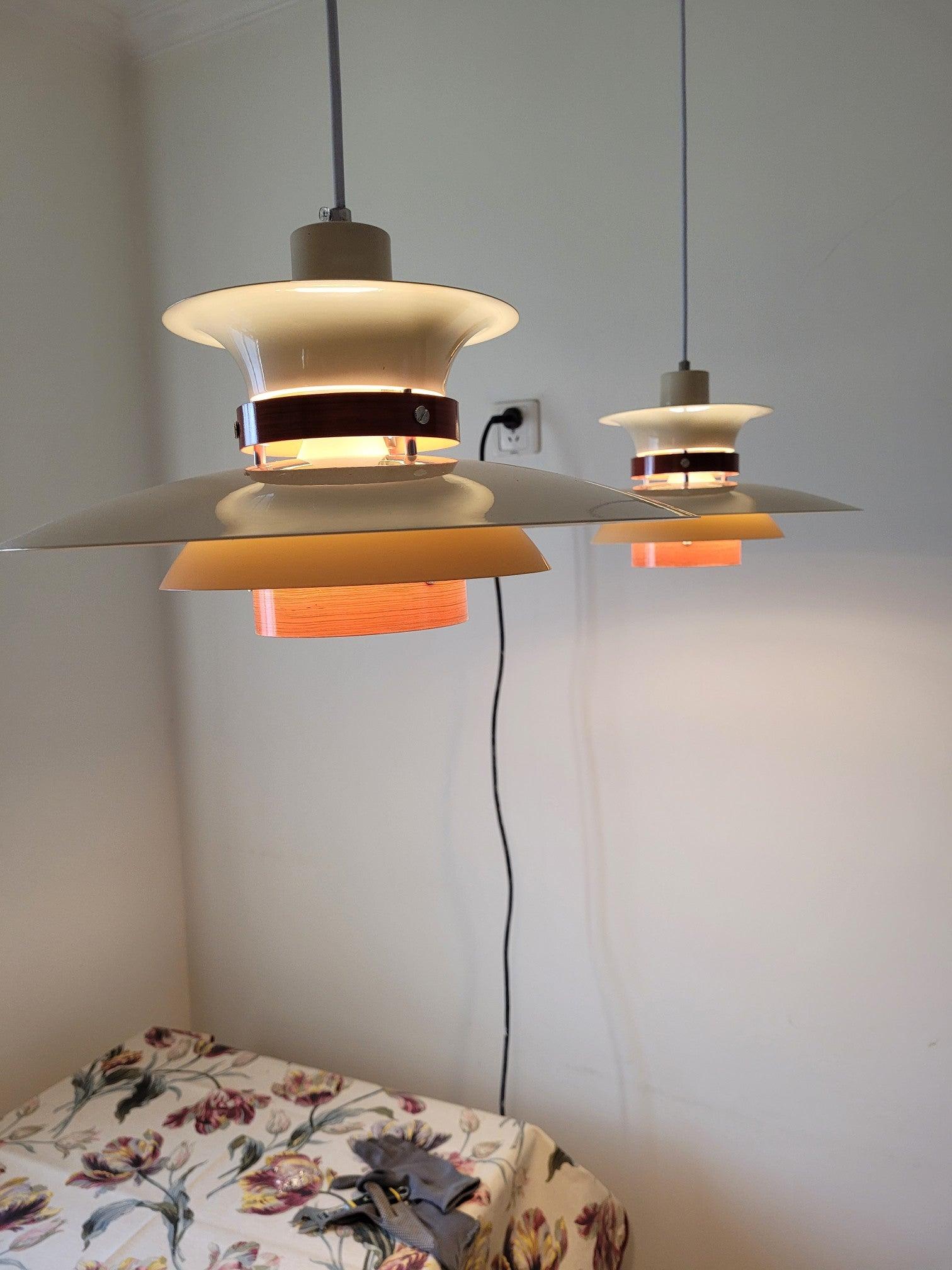 Two layered pendants shown together in an interior