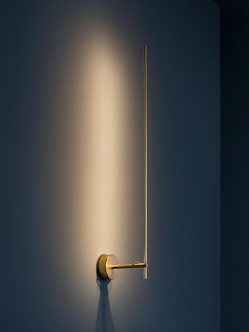 Light Stick V illuminating a dark Blue wall