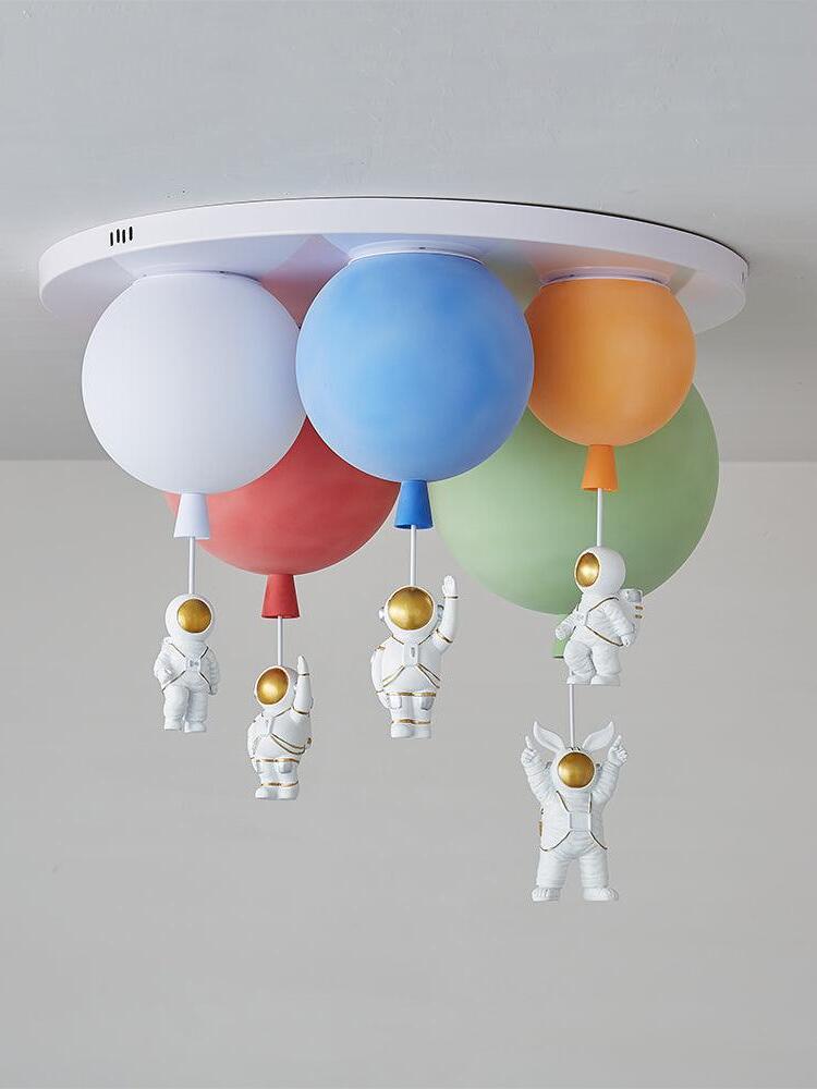 Five-balloon arrangement with blue red white orange and green shades