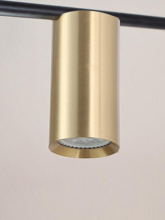 Cylindrical gold-coloured light head seen from below