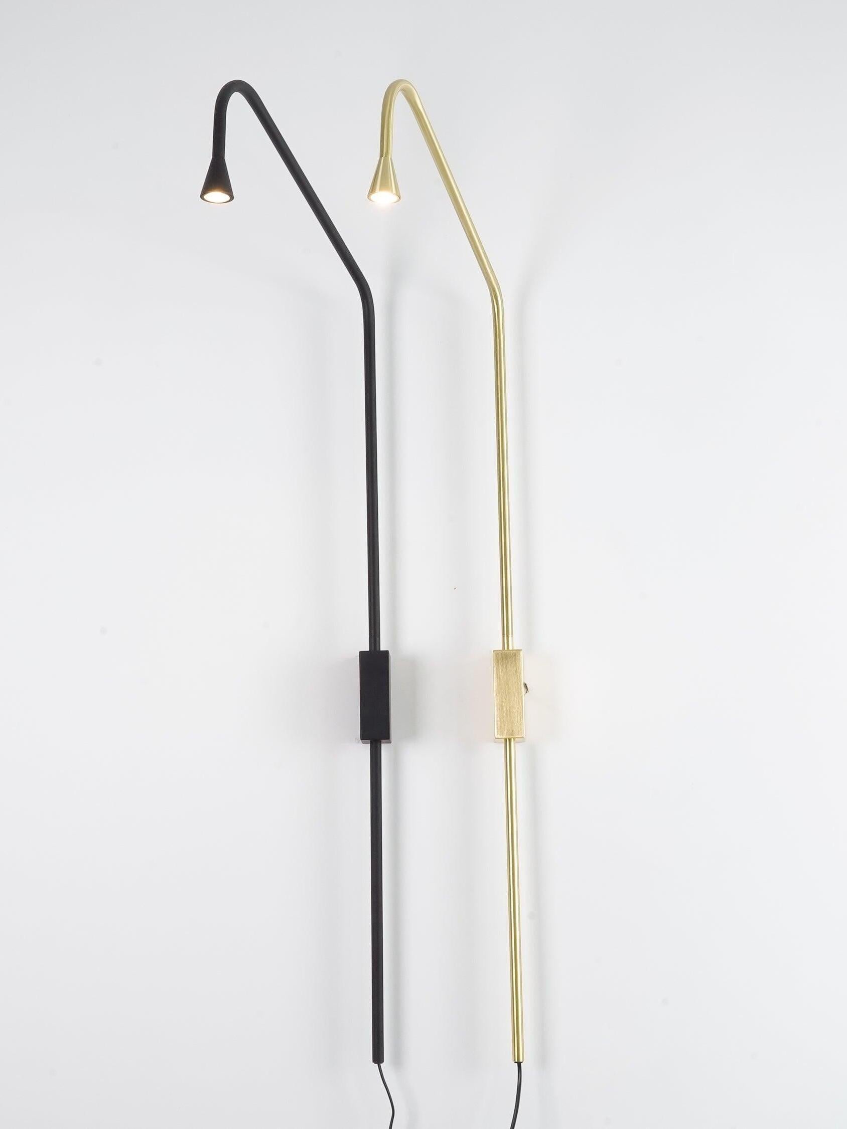 Angled view of Black and Golden Austere fixtures