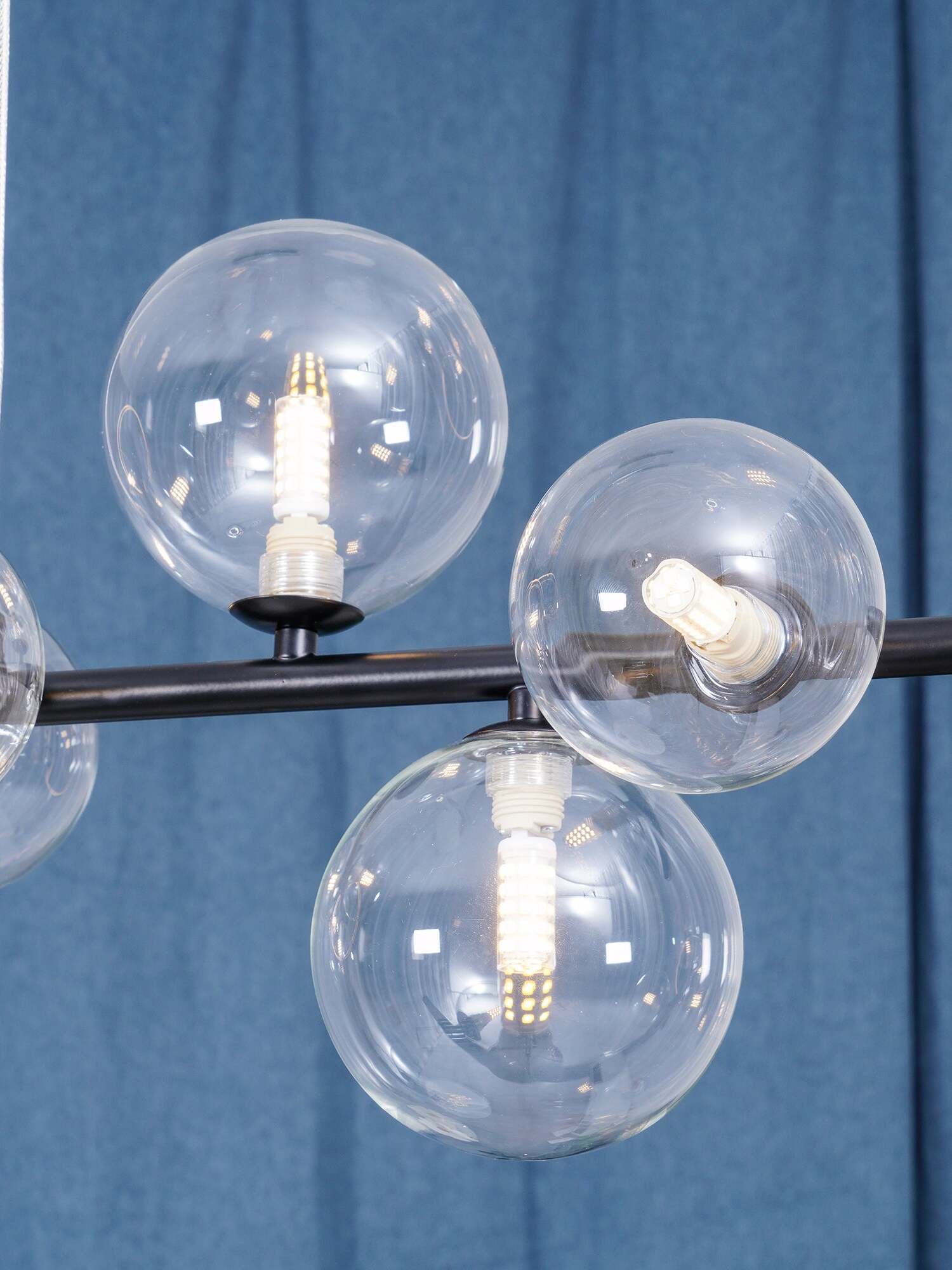 Close view of clear glass globes and small light sources