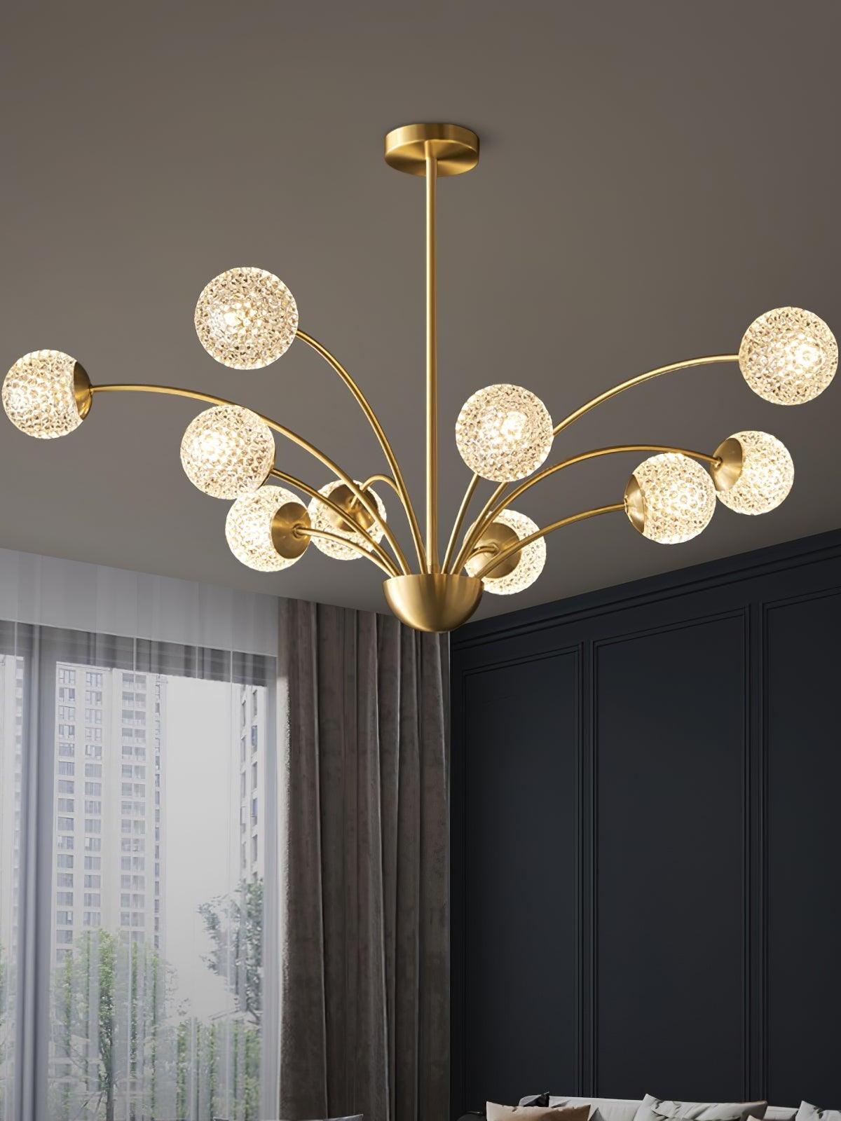 Glowing textured globe chandelier before a dark paneled wall beside a window with sheer curtains