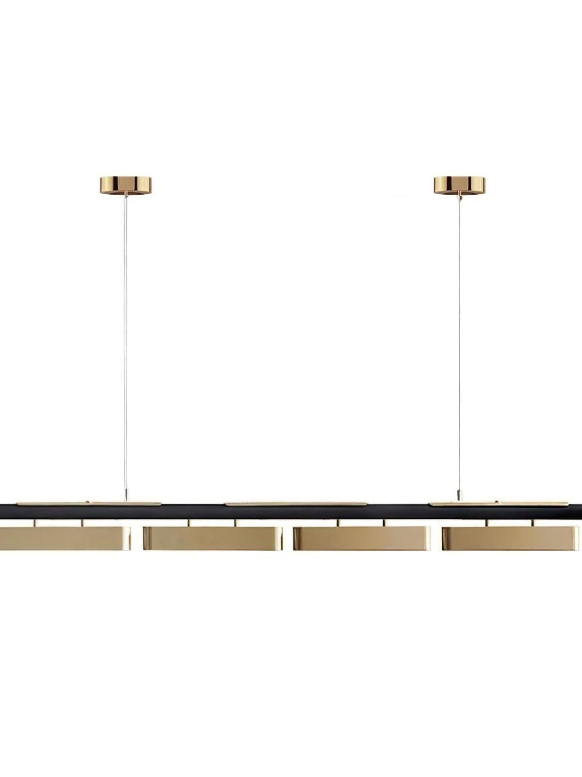 Colt four-module linear pendant and two round canopies against white, with brass housings below the black rail