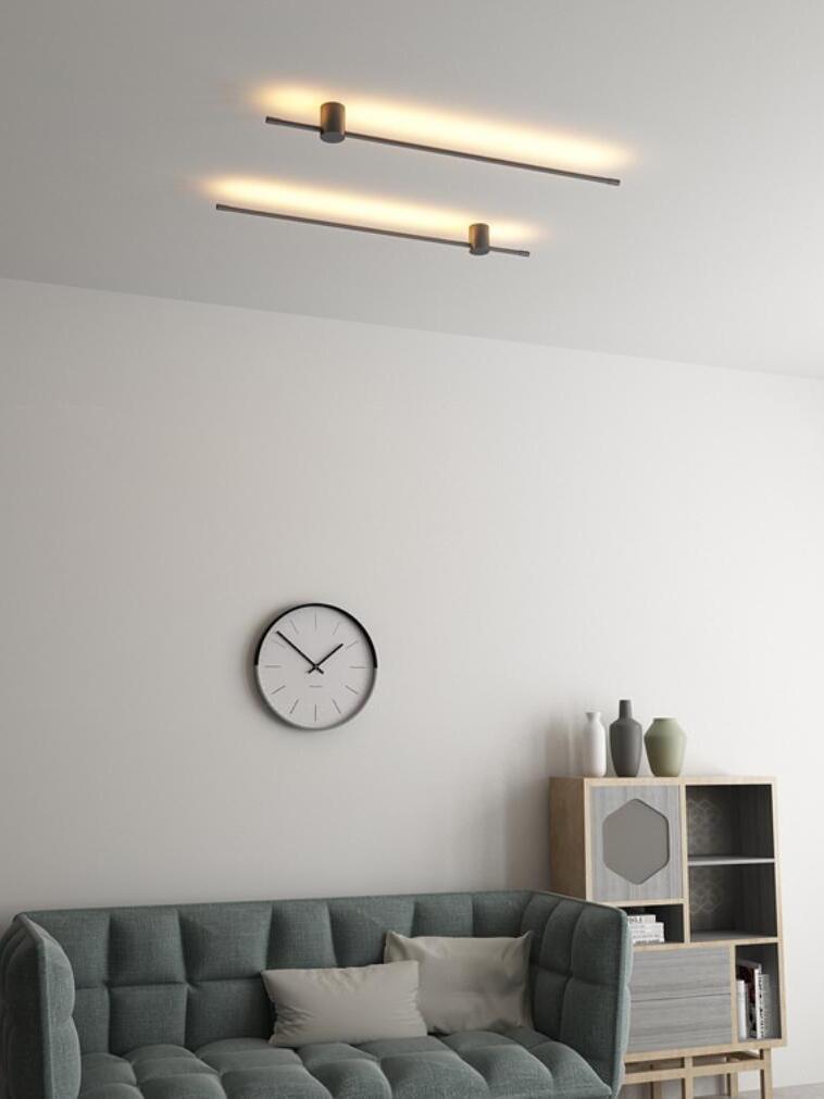 Two ceiling-mounted rods above a seating area