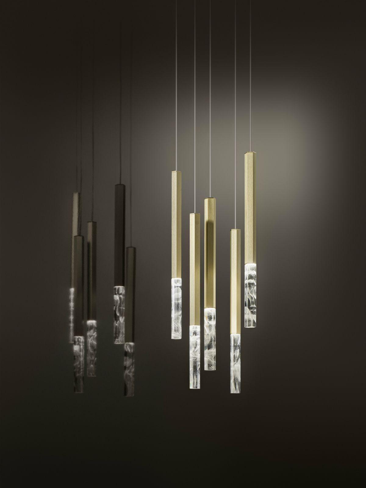Black and gold vertical crystal arrangements shown side by side