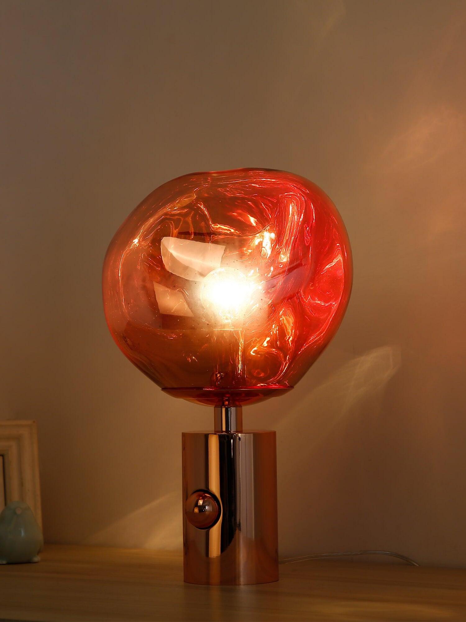 Warm-looking glow inside a reflective rounded shade