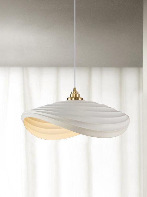 Wide solid White ribbed pendant in front of curtains