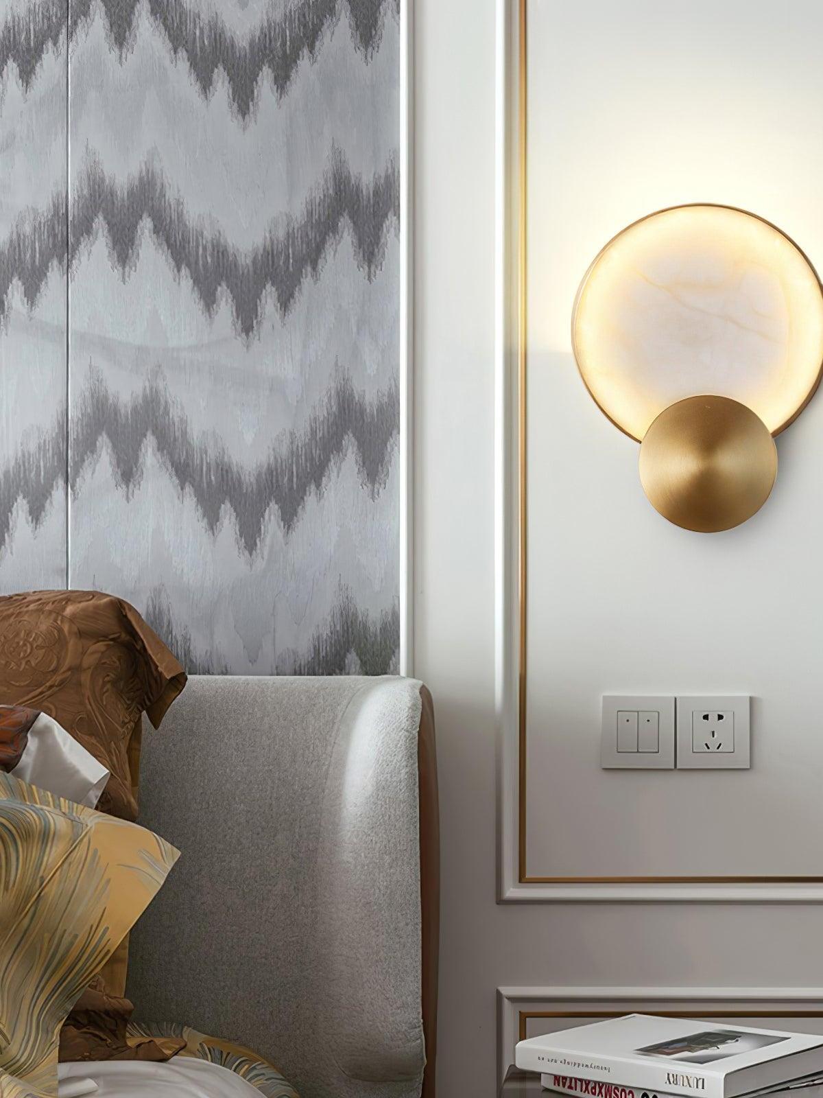 Terra Svet beside a bed and patterned curtain