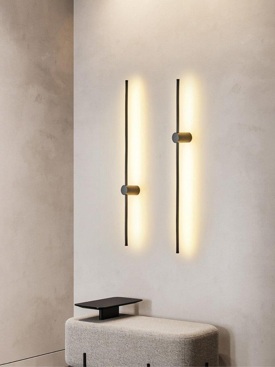 Two vertical rods above a pale console