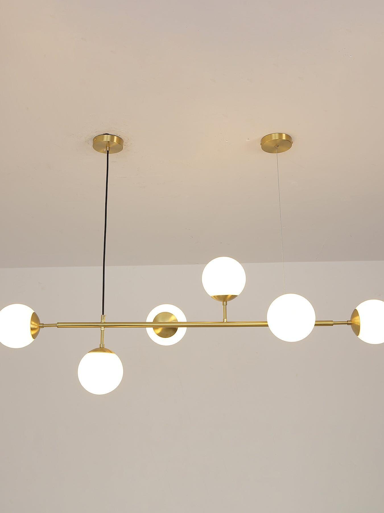 Illuminated white globe row close view