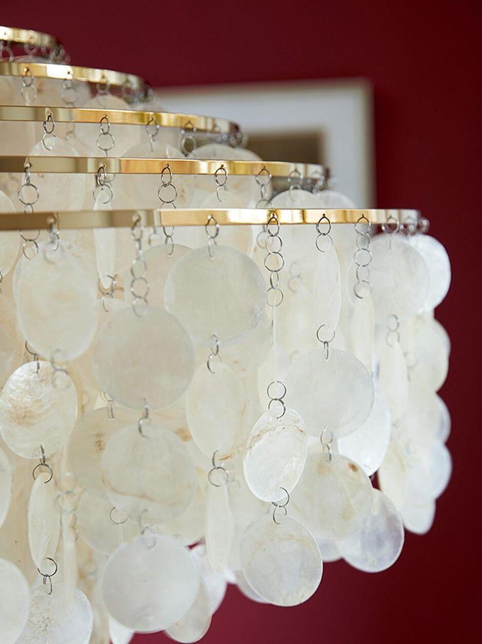 Close-up of shell chains and stepped metal rings