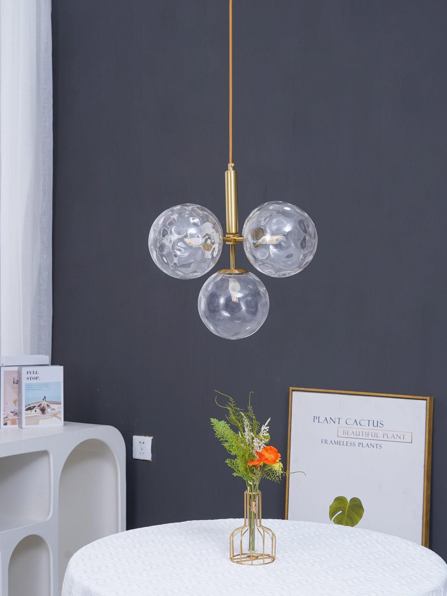 Clear glass cluster against a dark wall