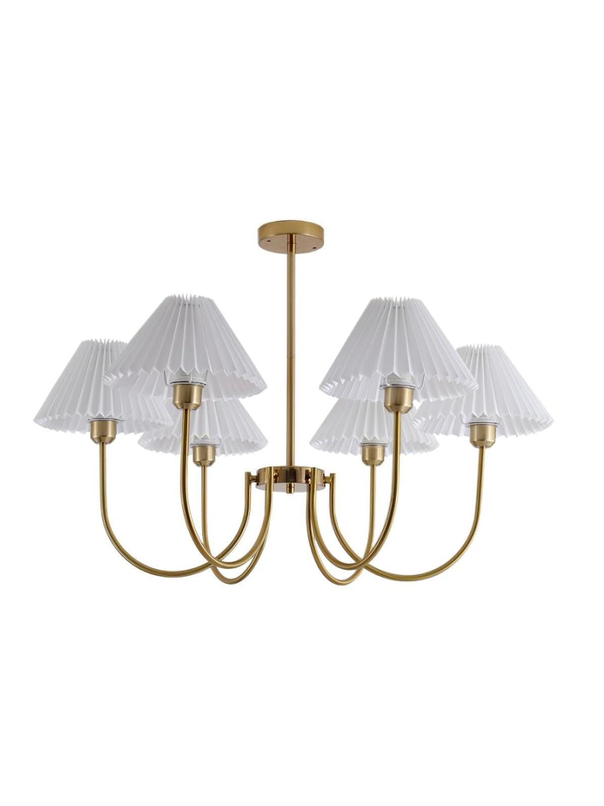 Six-shade Lenore chandelier with white pleated shades and curved arms on a white background