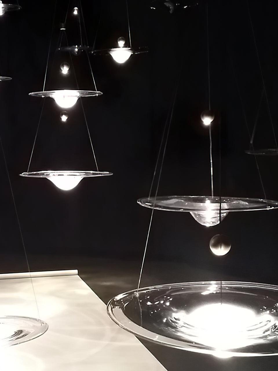 Close view of illuminated glass discs at different heights