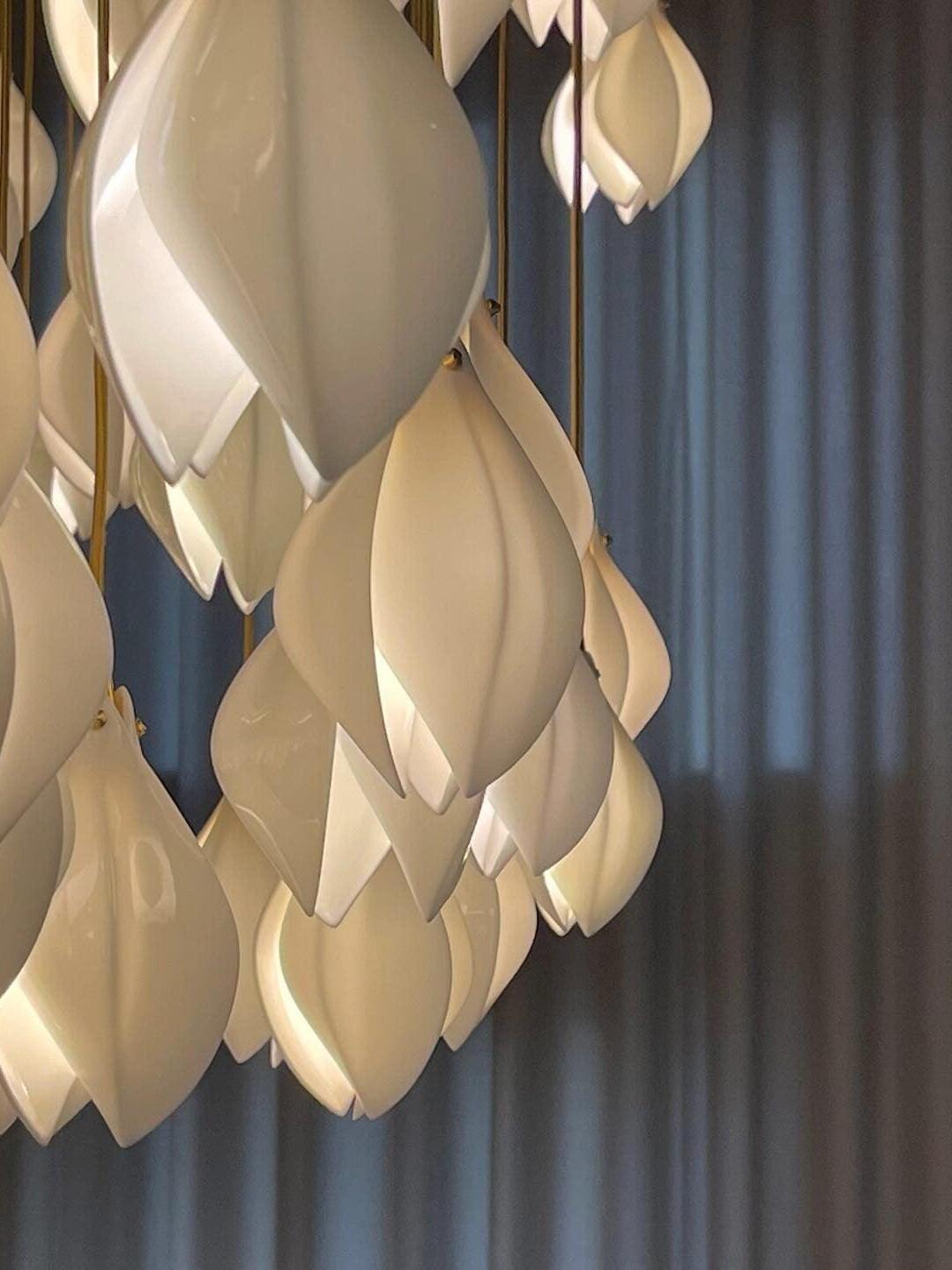 White curved petals and narrow hanging leads