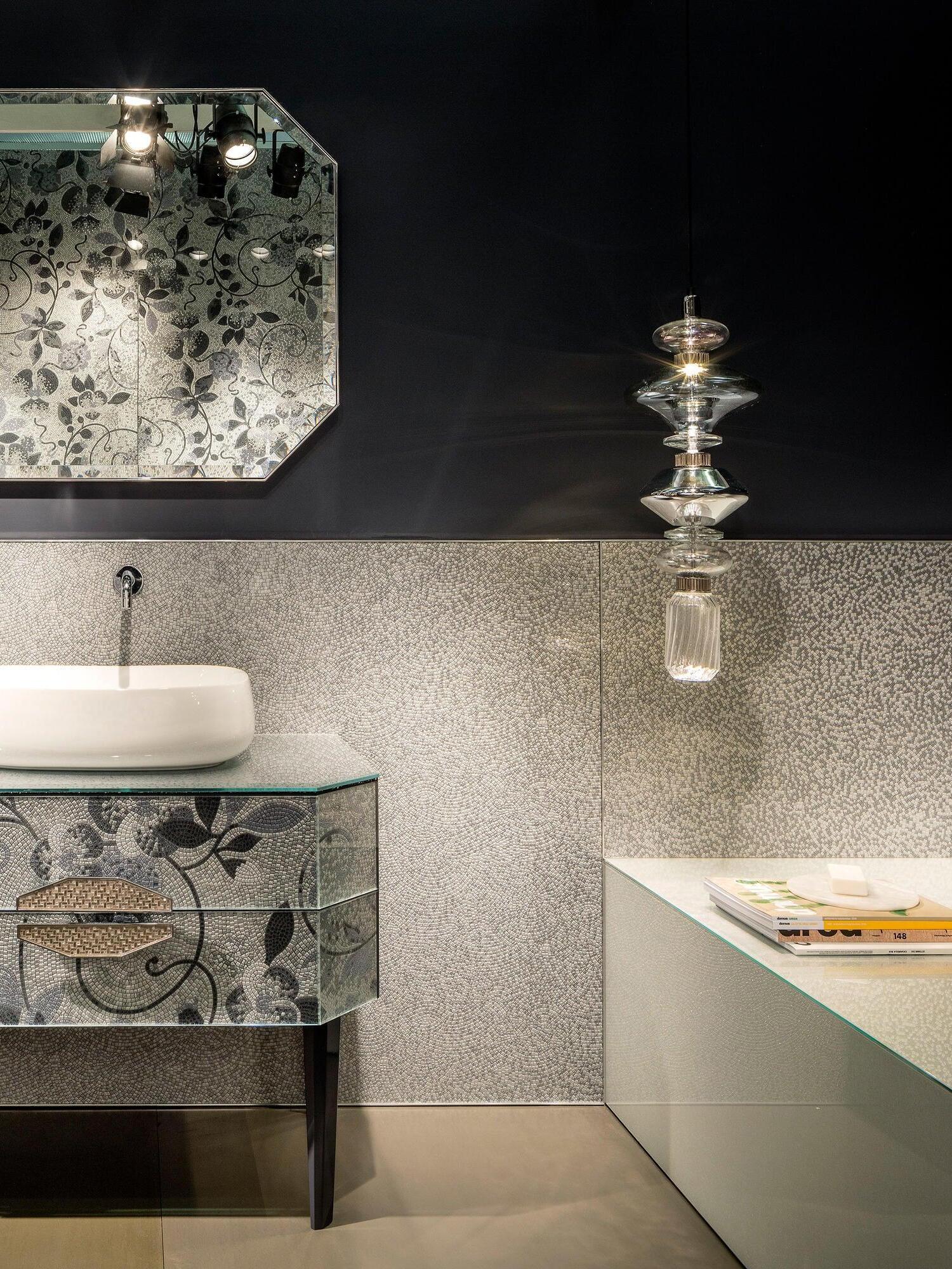 Single stacked glass pendant beside a bathroom basin