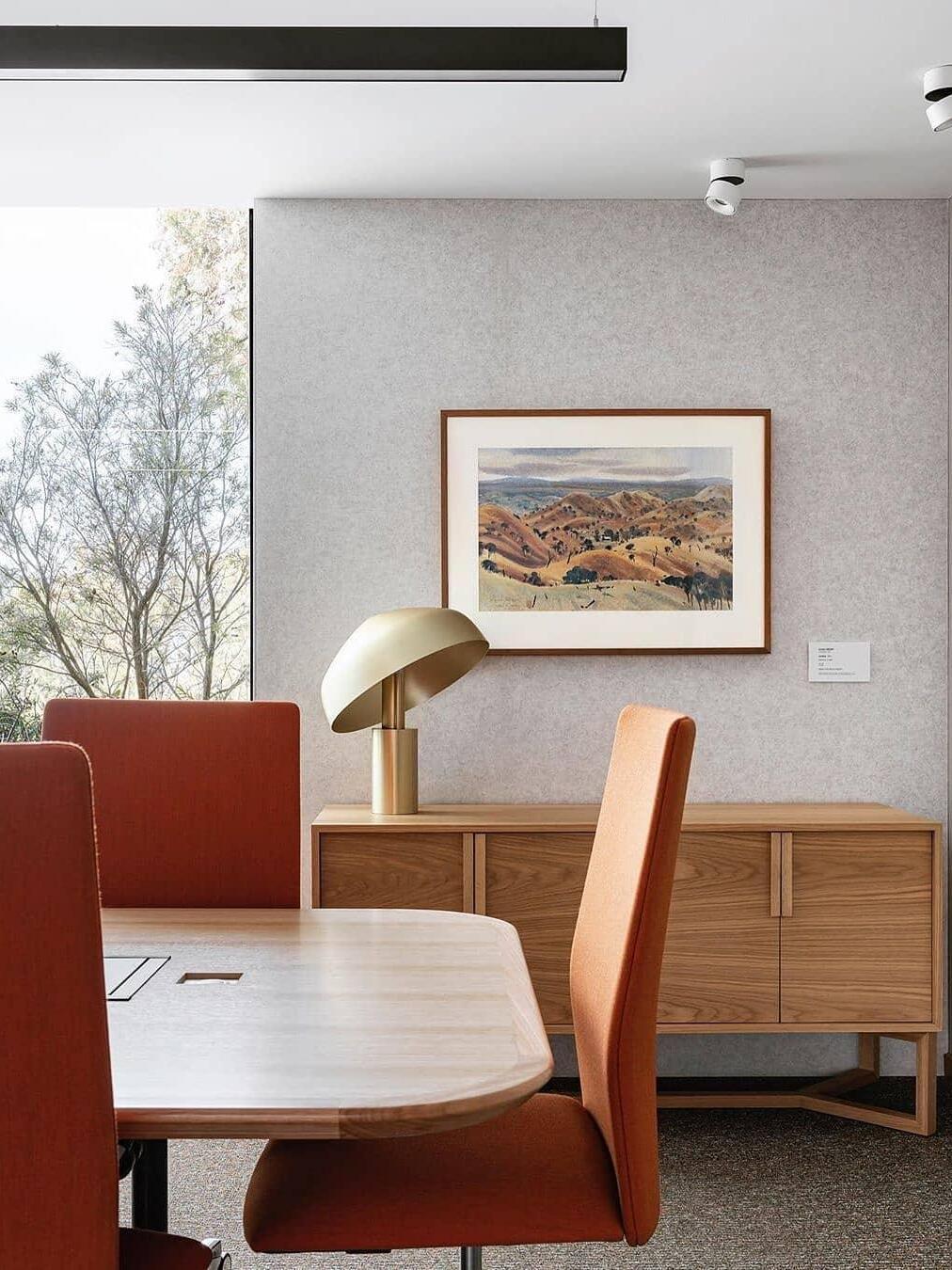 Gold dome lamp on dining-room sideboard