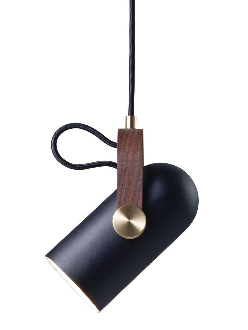 Black cylindrical pendant tilted diagonally, showing dark wood bracket, round gold-tone pivot and black cable loop