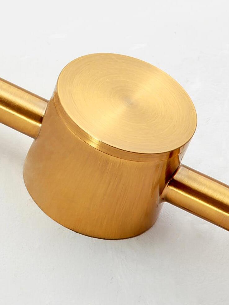 Close view of round gold-colour wall fixing on metal rod