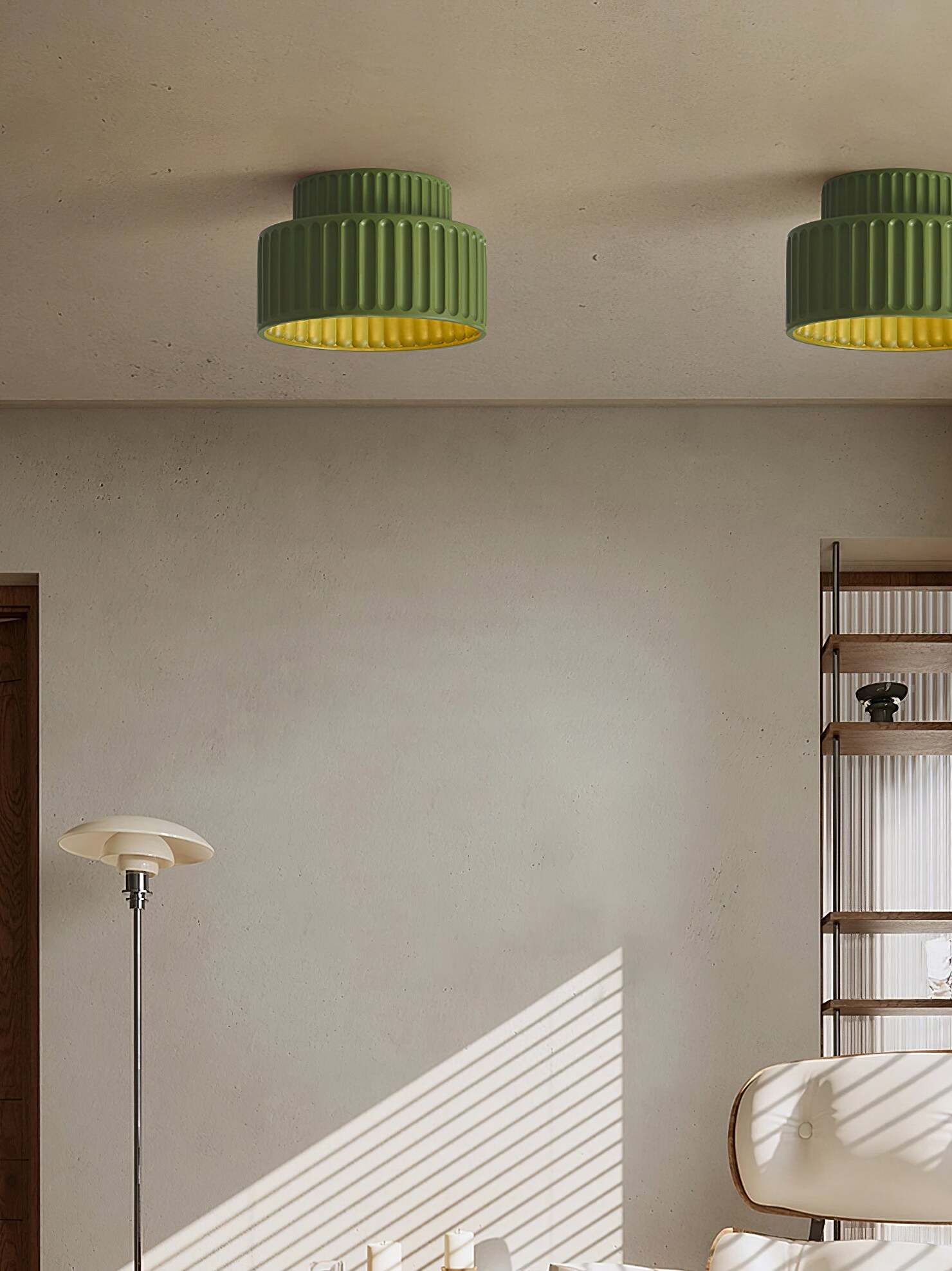 Two separately mounted green ribbed ceiling lamps