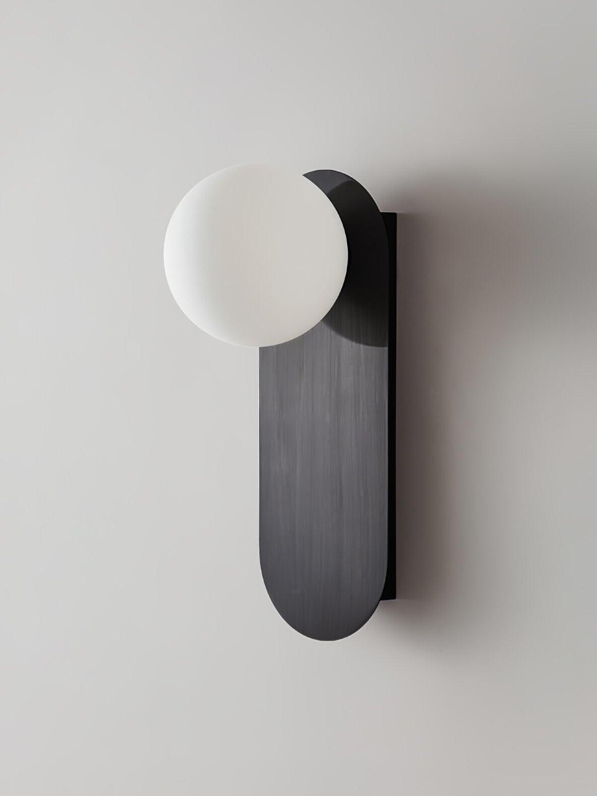Unlit White globe on a brushed dark plate